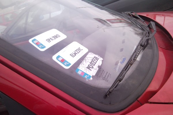 Why do Poles need registrtion stickers on car windows?